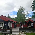 Family Cluster By Waterfall In * Bjorli