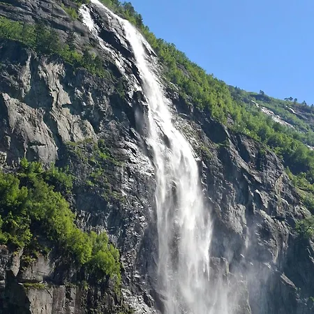 Family Cluster By Waterfall In *
