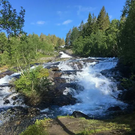 Family Cluster By Waterfall In Сasa de vacaciones Bjorli